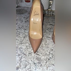 Christian louboutin only worn twice , no scratches